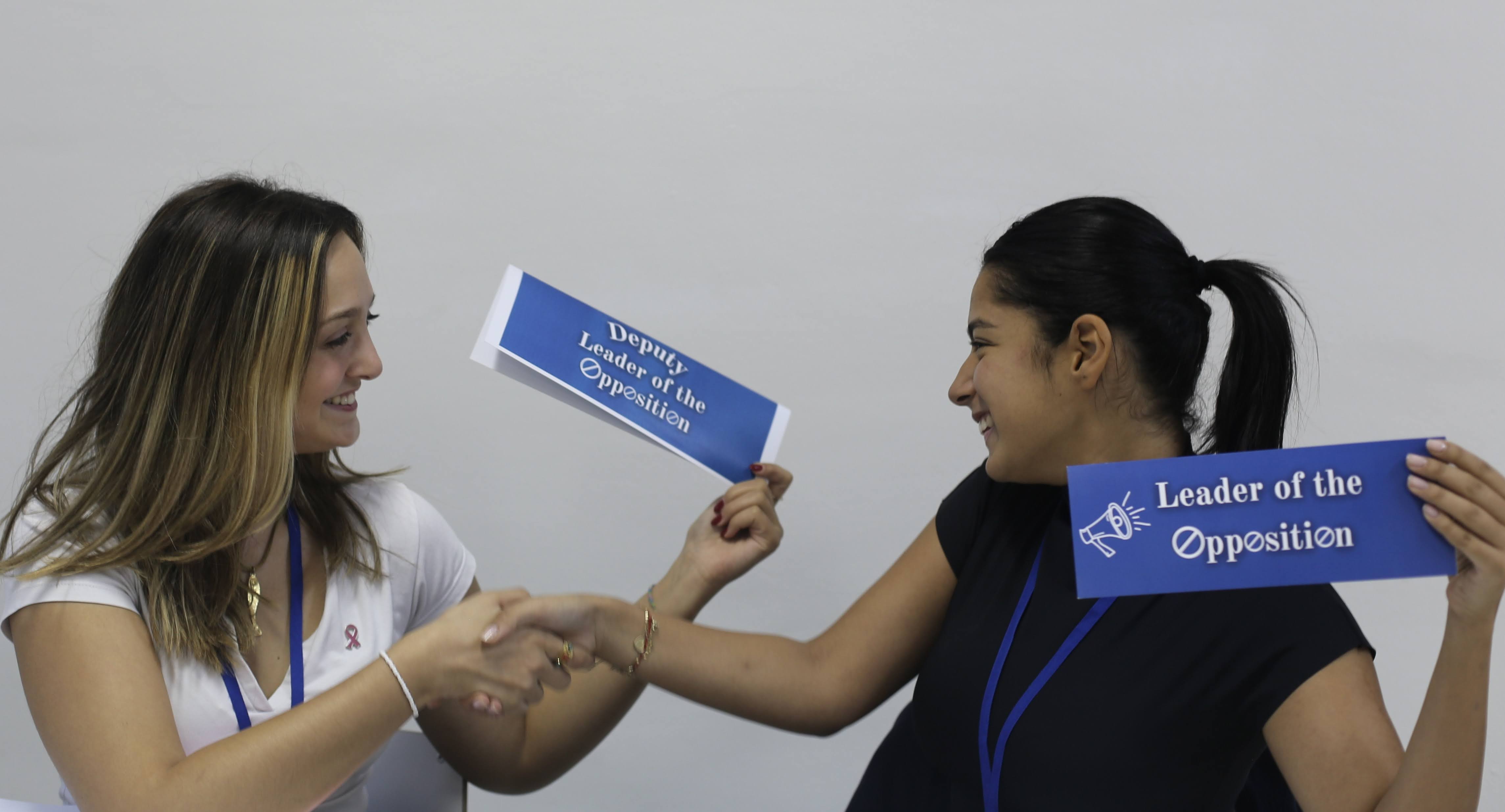 Debaters with role cards